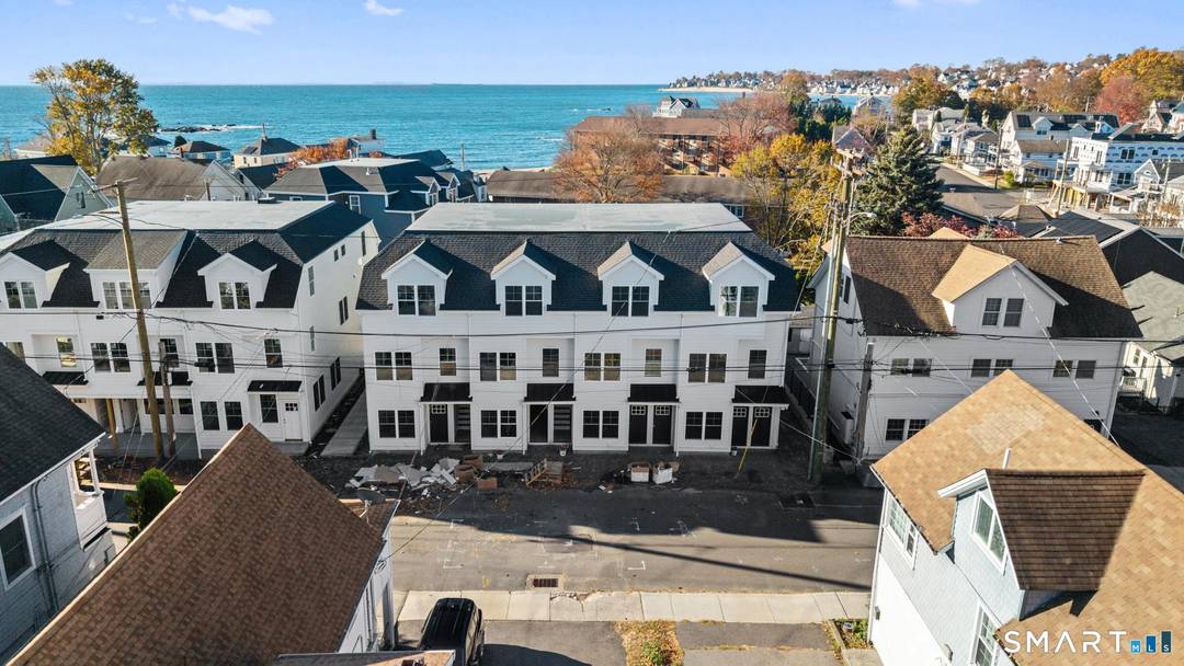 Brand new, never lived in three bedroom END UNIT townhome with water views from the bedroom.