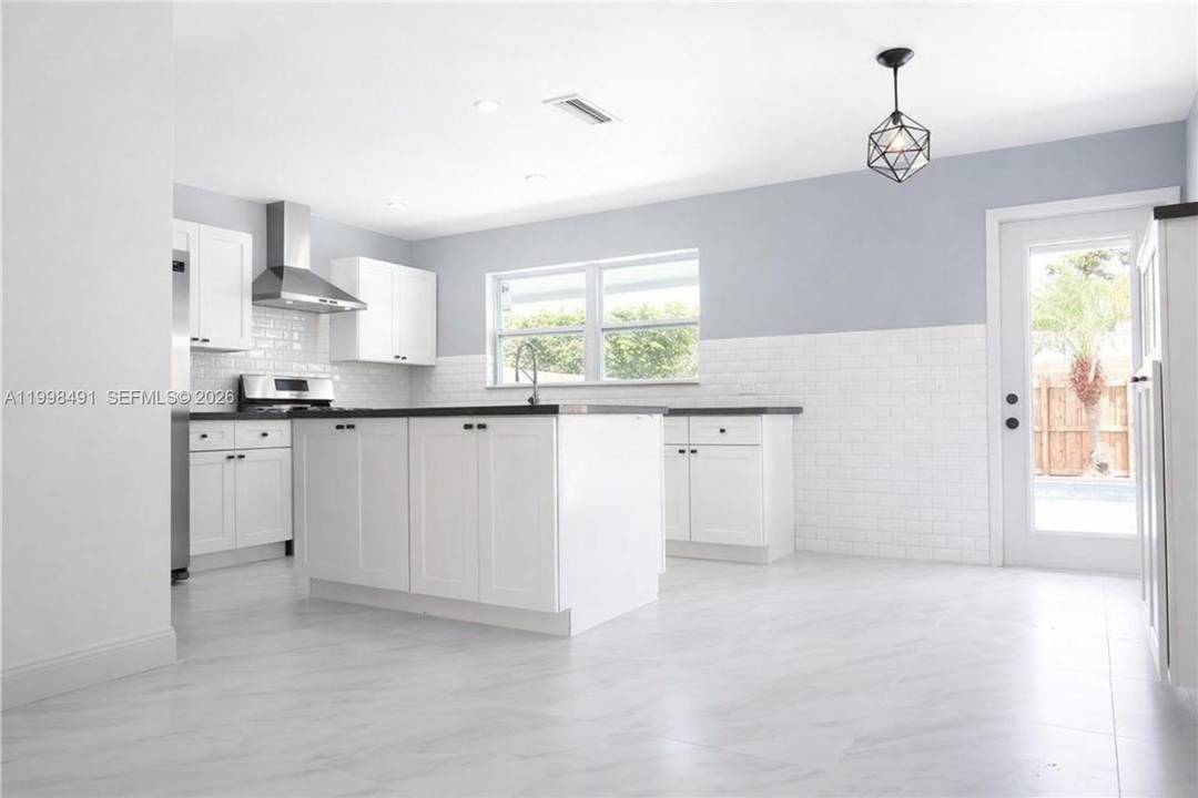 Beautifully updated and move in ready 3 bedroom, 2 bath pool home in Sunrise with a bright, open feel and abundant natural light.