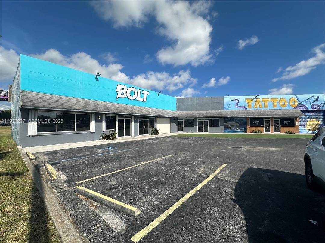 Prime commercial retail center just off the Florida Turnpike offering exceptional visibility along a high traffic corridor.