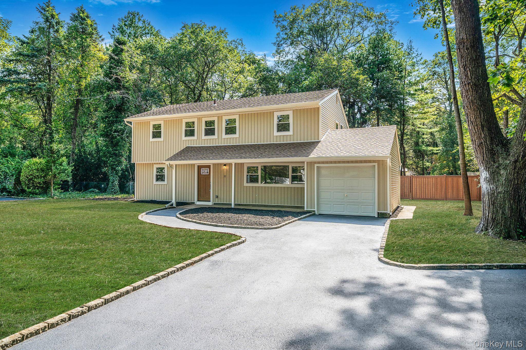 Welcome to 12 Andover Place, a beautifully renovated 4 bedroom, 3 bath Colonial offering modern upgrades and comfortable living.