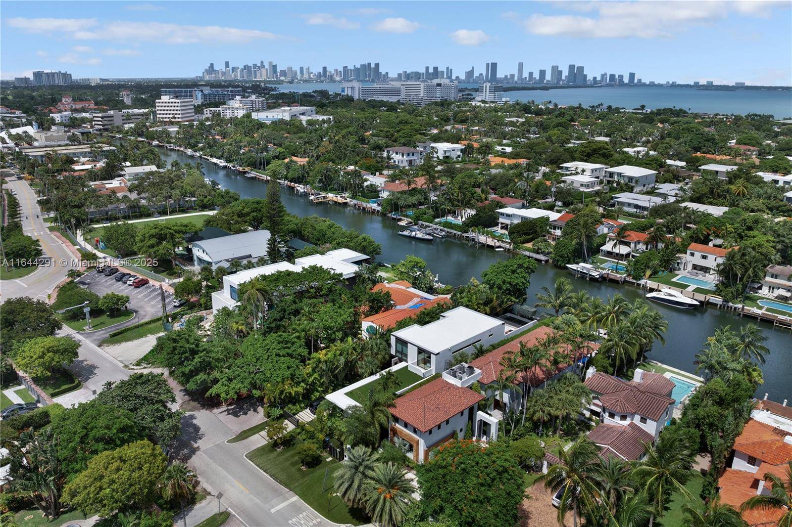 Dive into the tropical fully renovated turnkey waterfront Modern Mediterranean villa boasts 6 beds 7 baths w white oak wood floors, arched doorways, floor to ceiling glass windows unveil natural ...