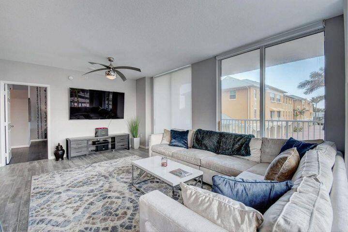 DESIRABLE CORNER UNIT FACING SE, VIEWS OF INTRACOASTAL, FISHING BOATS, DIVE BOATS, BEAUTIFUL INTRACOASTAL OCEAN AVE BRIDGE, LARGE 3 2 W 39' WRAP BALCONY, WALK TO OCEAN, RESTAURANTS, ENJOY RESORT ...