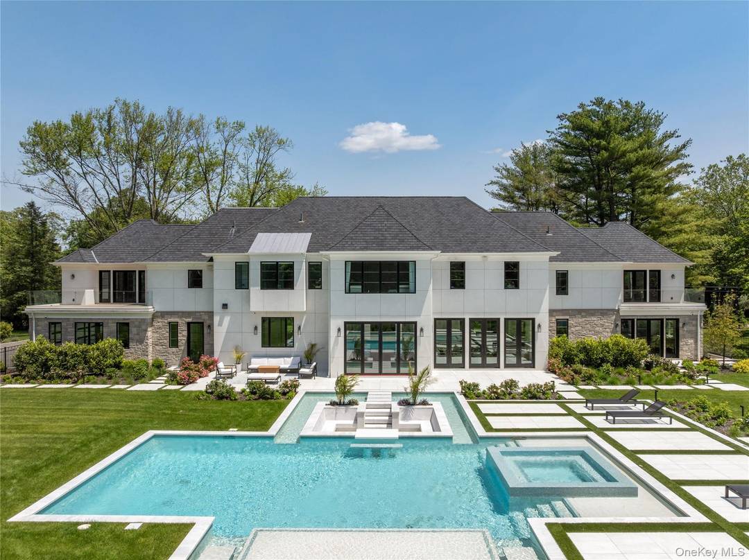 Set on 2 private and beautifully landscaped acres at the end of a cul de sac in the coveted Broad Hollow development of Brookville, this newly built estate offers over ...