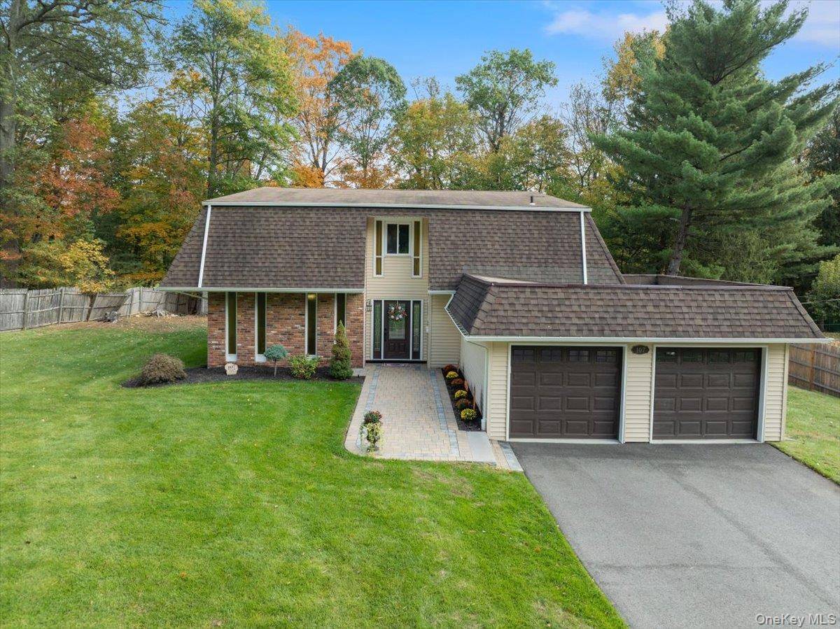 Welcome to 107 Tennyson Drive, a beautifully updated colonial split level home in the sought after Clarkstown Central School District.