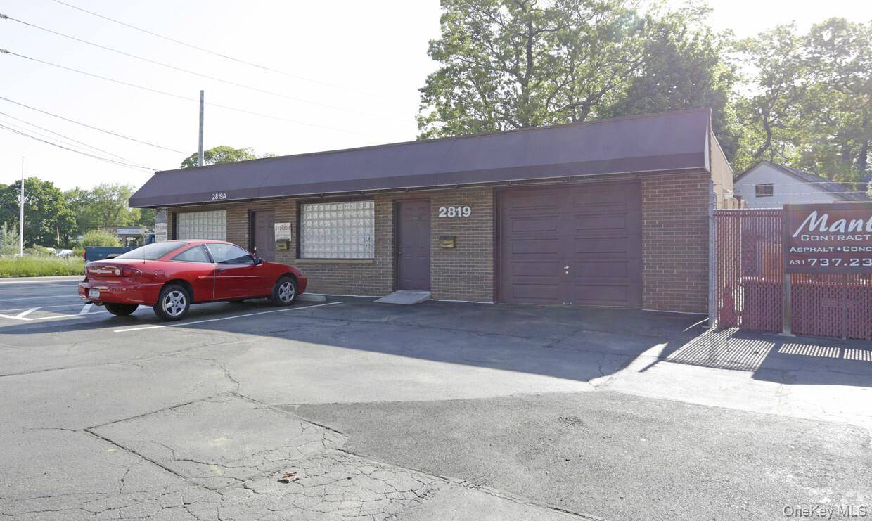 Unit 1 Open Bright office space on great corner lot for great exposure in Ronkonkoma close to the LIE and Lake Ronkonkoma.