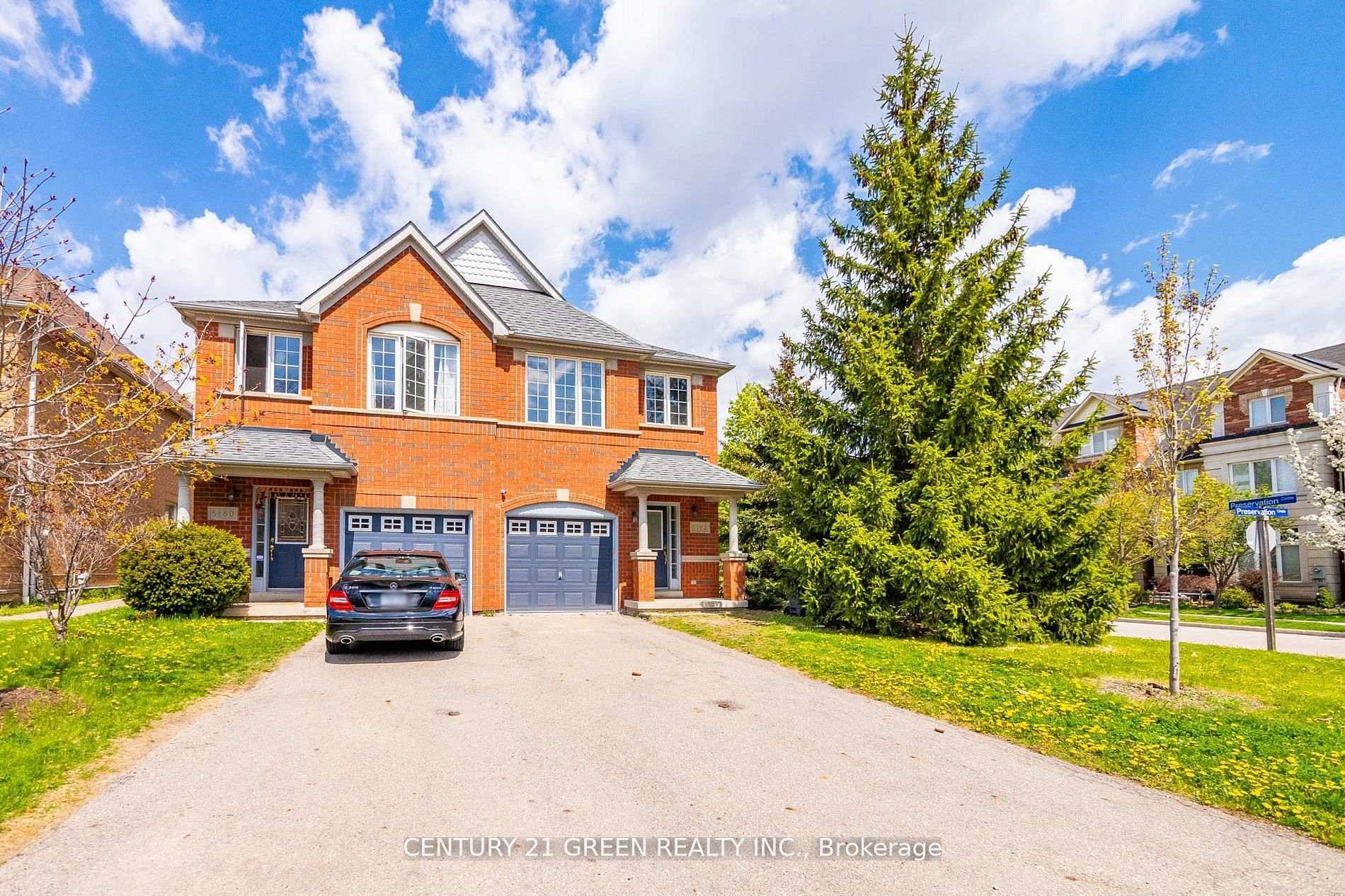 Absolutely Stunning Corner Semi detached house featuring 3 Bedrooms, 3 Washrooms, 3 parking spots and a Premium Lot with Lush Green Trees !