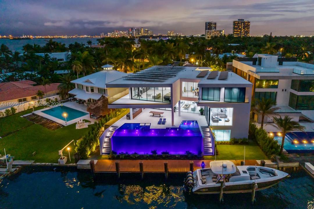 Stunning Bay Canal Contemporary Residence 100 ft on deep water New Construction total of 12, 924 SF under A C.