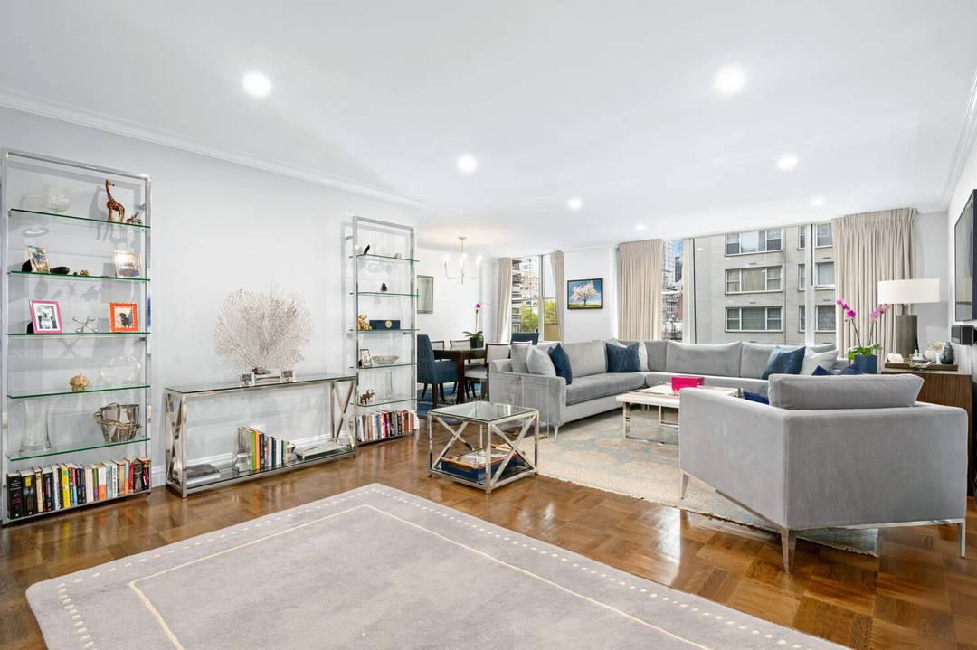 Bathed in western light and refined in every detail, this beautifully renovated two bedroom residence offers a quiet sense of grandeur just moments from Fifth Avenue and Central Park.