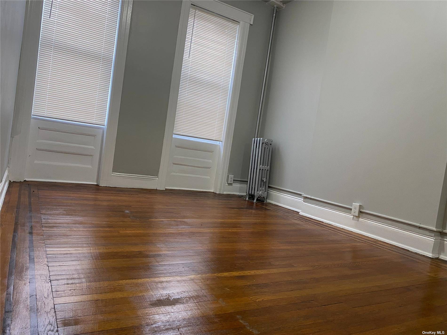 In woodhaven Queens, completely renovated ; 3 Bedrooms, formal dining room, living room, Kitchen, full bathroom, hard wood floors, many closets, close to all transportation, businesses, parks, schools ect.