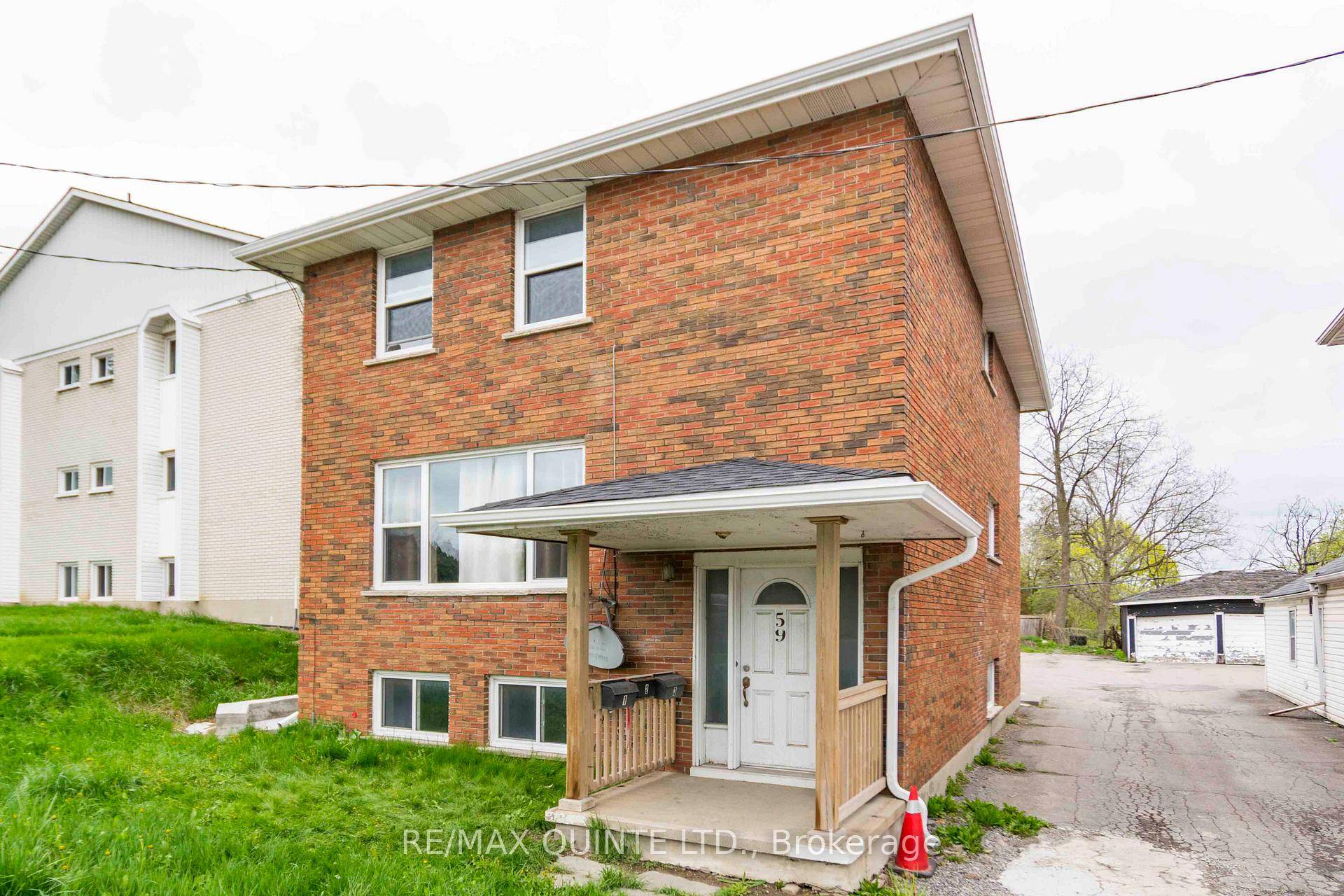 Charming Brick Triplex in the Heart of Town !