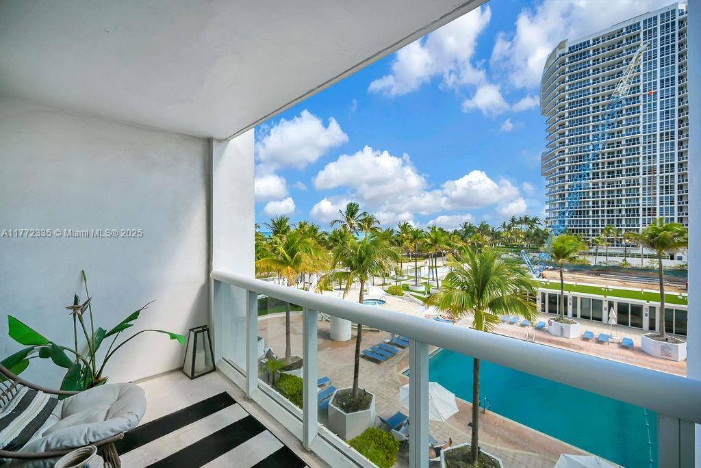 Welcome to your dream one bedroom, one and a half bath residence at Harbour House, where modern elegance meets breathtaking oceanfront views.