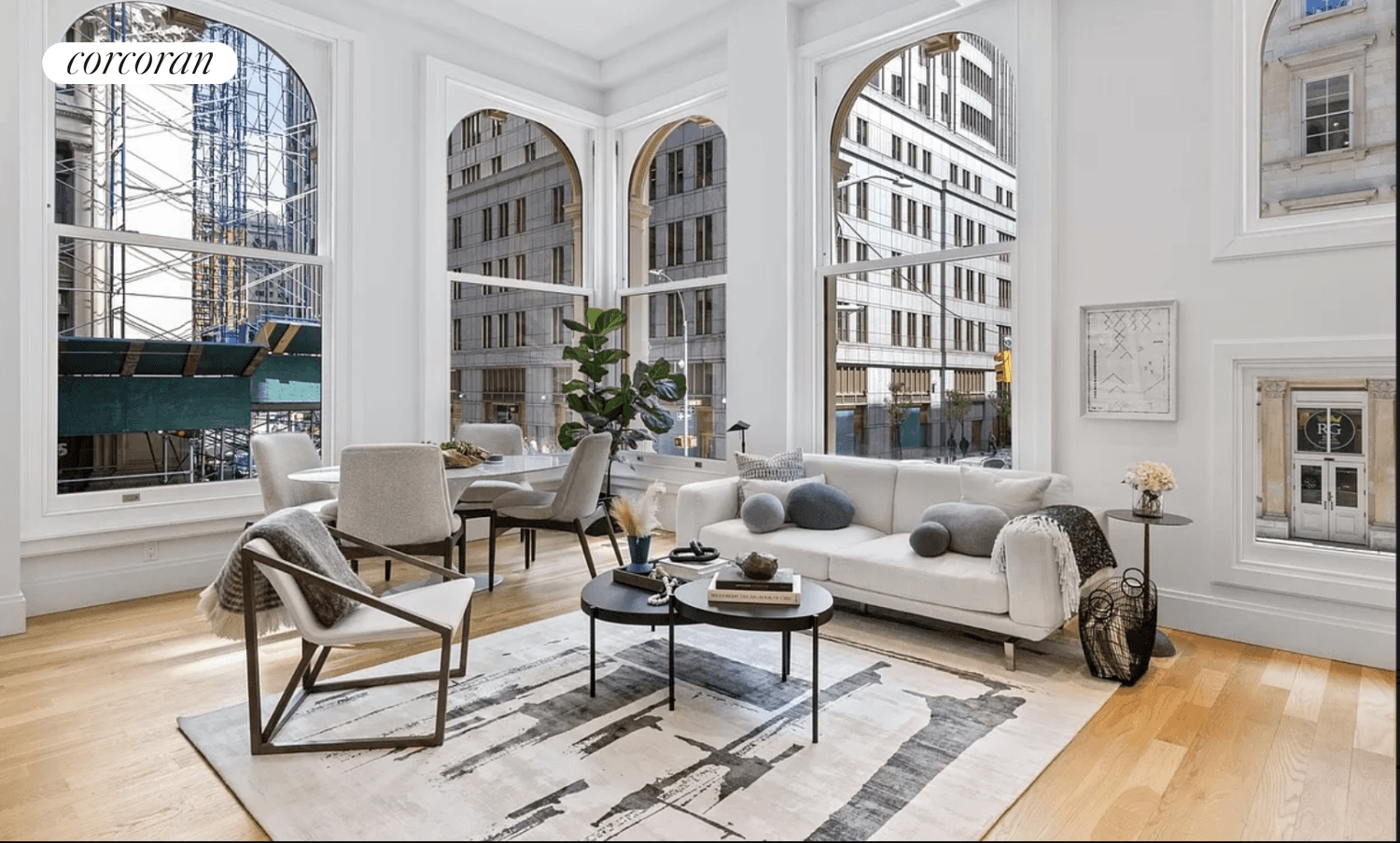 2 Bedroom 2 Bathroom Loft This stunning apartment boasts a charming corner living and dining area adorned with 6 expansive arched windows approximately 8 feet tall.