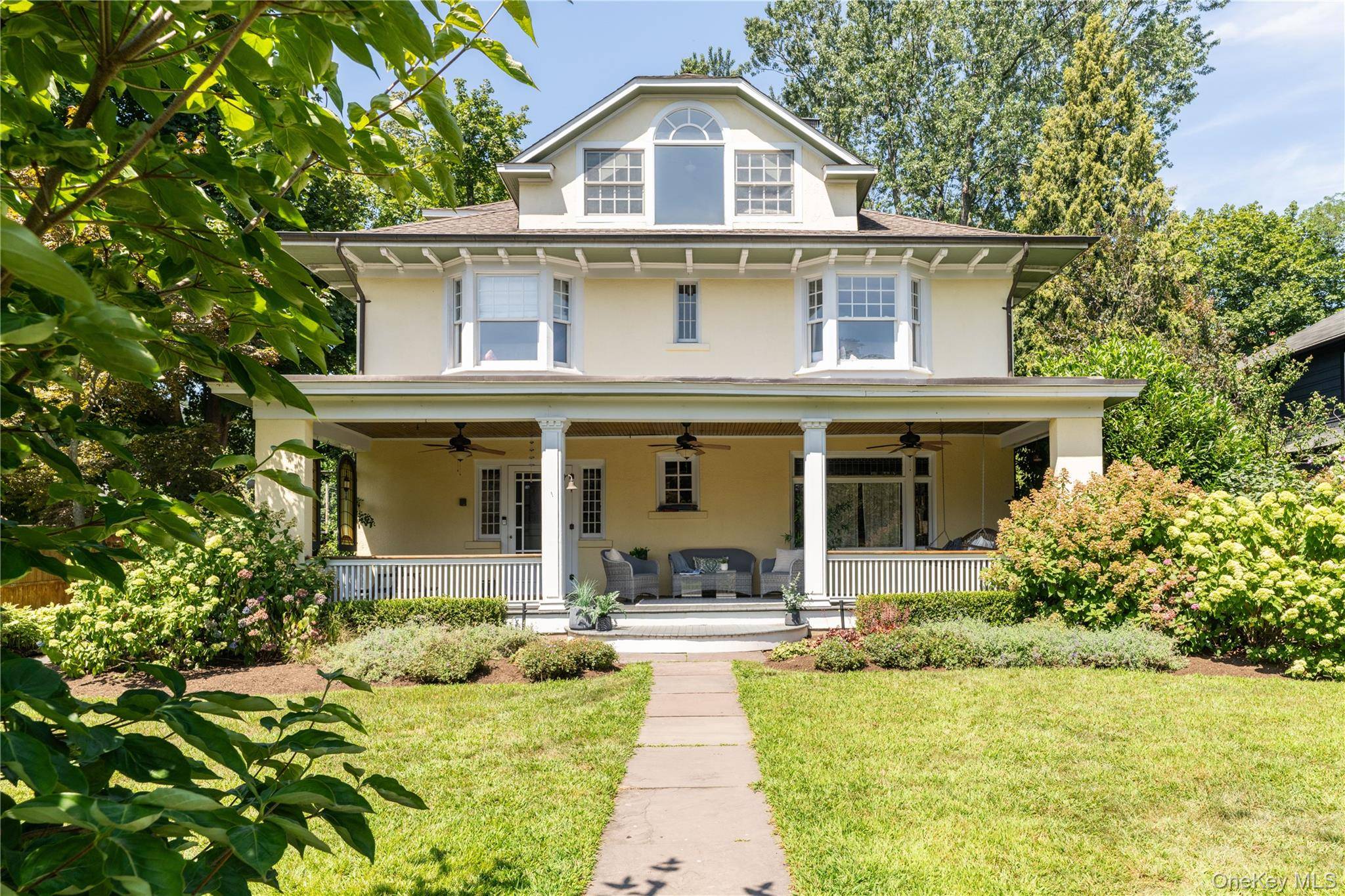One block from the Hudson River on a quiet dead end street, this stunning 5 bedroom, 2.