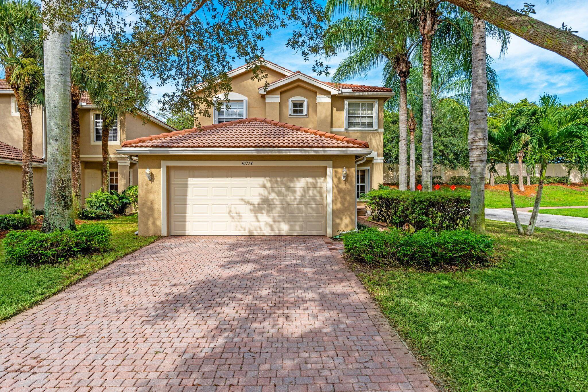 Beautifully positioned on a corner lot, this well maintained home offers extra privacy and space in a desirable Boynton Beach location.