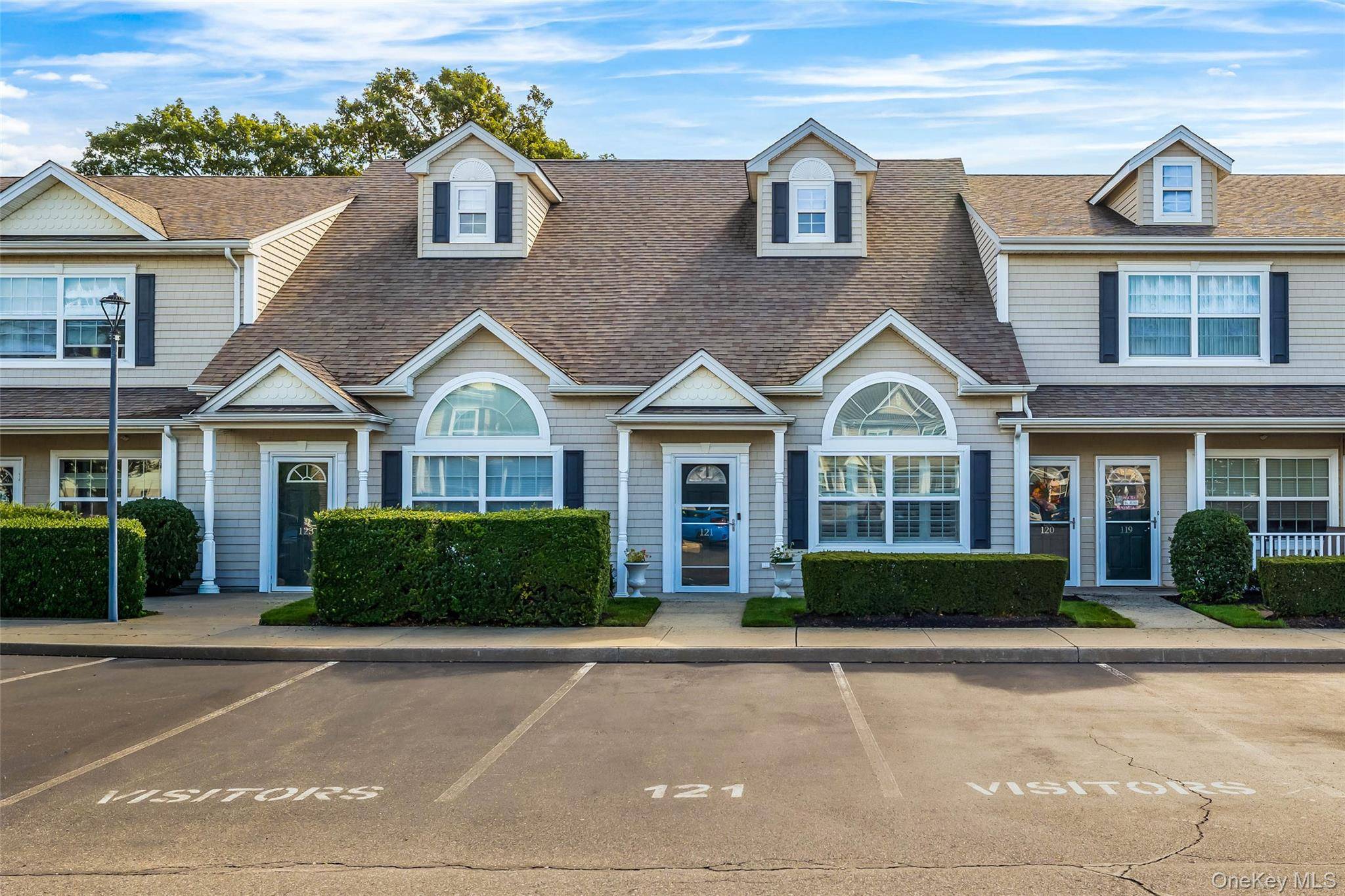 121 Willow Lane offers a refined retreat inside Valley Stream s 55 gated community.