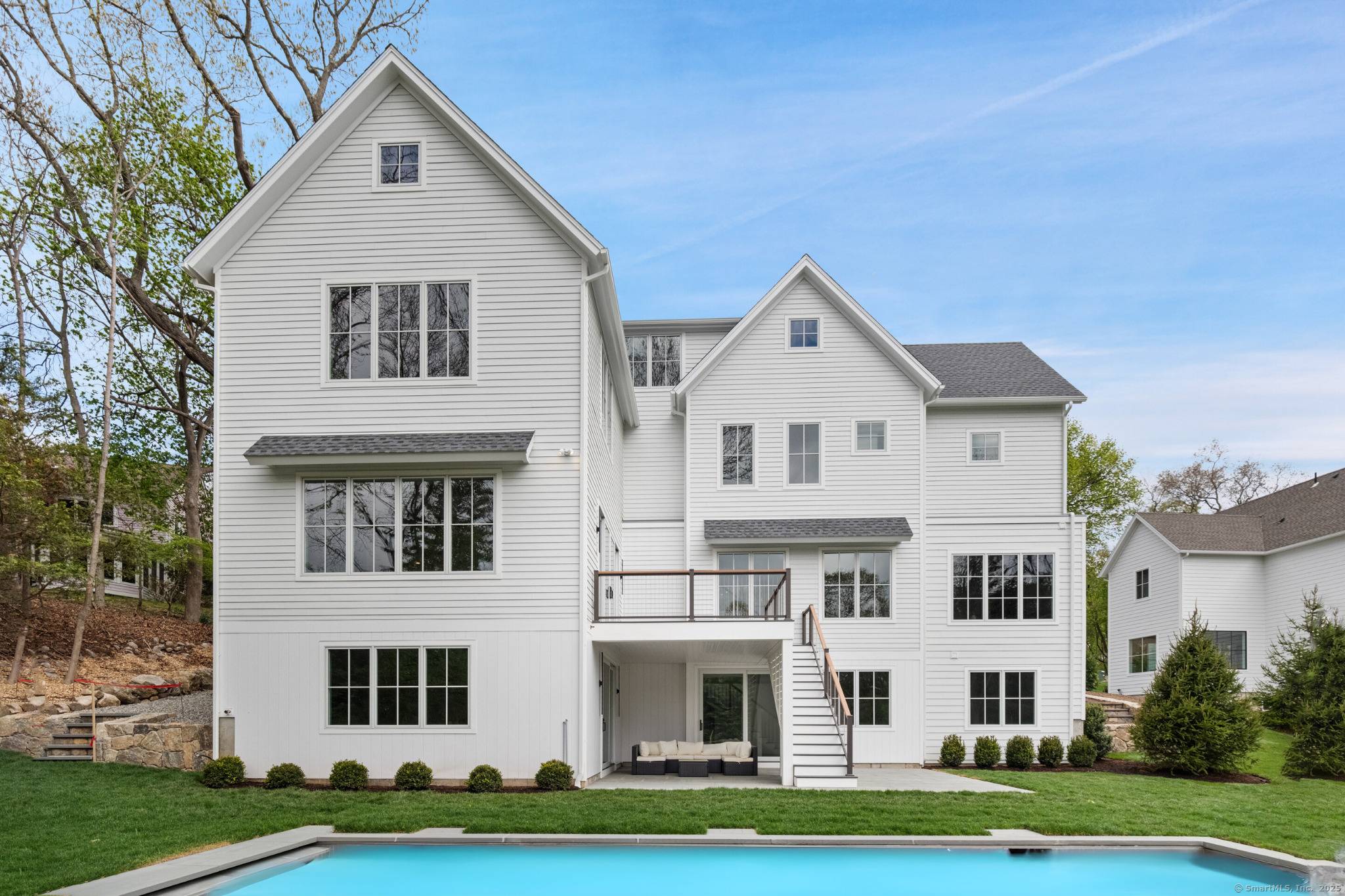 THE ESTATES AT COMPO SOUTH SIR Development presents the last of two luxury residences set back on beautiful property, each with their own distinct Modern style and pool.