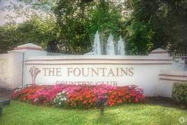 Desirable first floor 2 2 condo in The Fountains Country Club.