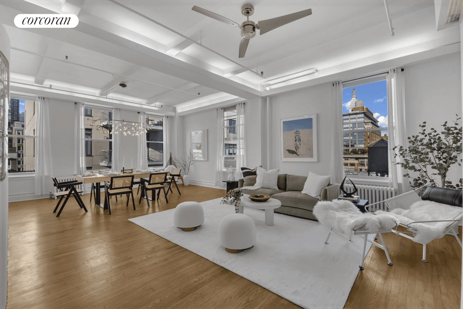 Authentic corner loft highlighted by six oversized windows that flood the space with natural light and great views on the Manhattan skyline.