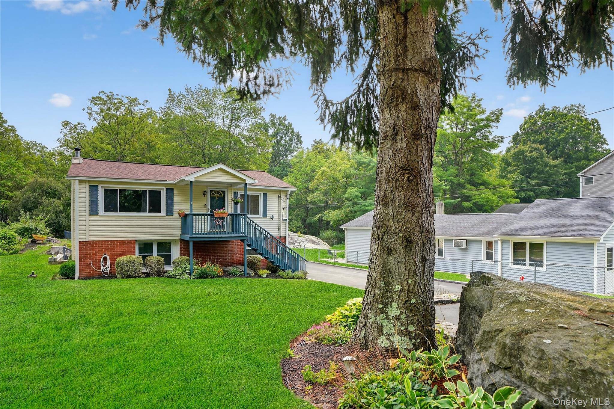 Welcome to this charming and versatile 2 bedroom, 2 bath ranch style home nestled on a quiet cul de sac in Peekskill.