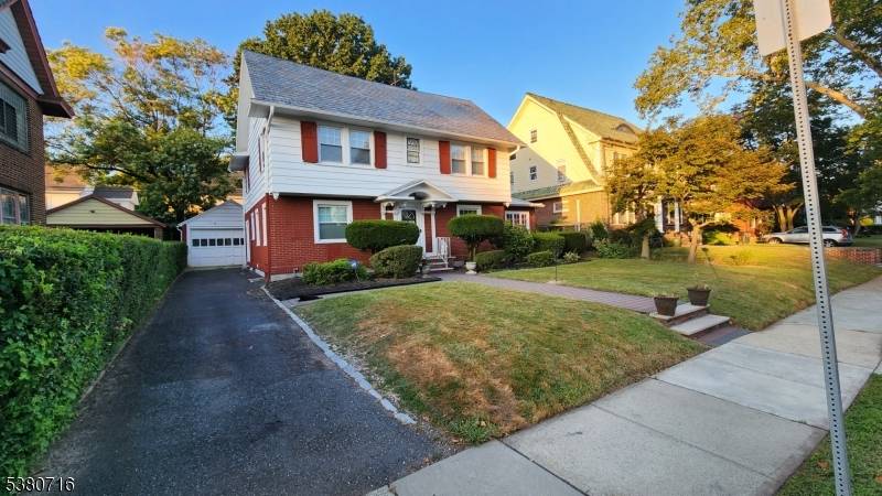 Situated on one of Newark's most sought after streets is this stunning Colonial showcasing a slate roof.