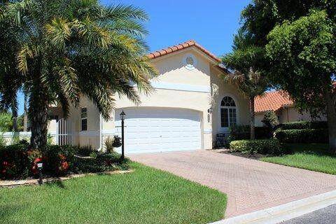This three bedroom, two bath home and 2 Car garage is centrally located in Delray Beach.