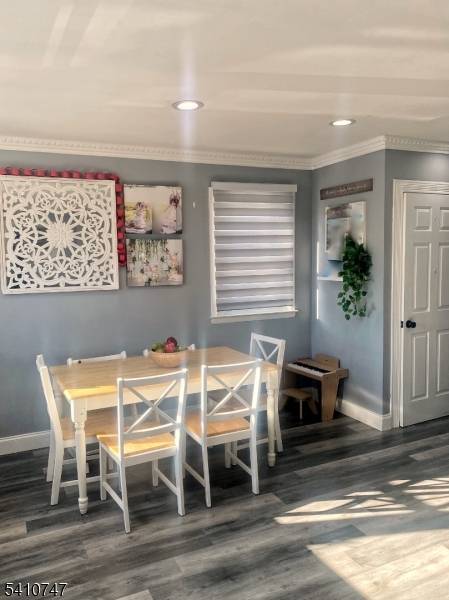 Welcome to this stunning, fully renovated two family home offering comfort, versatility, and modern living.