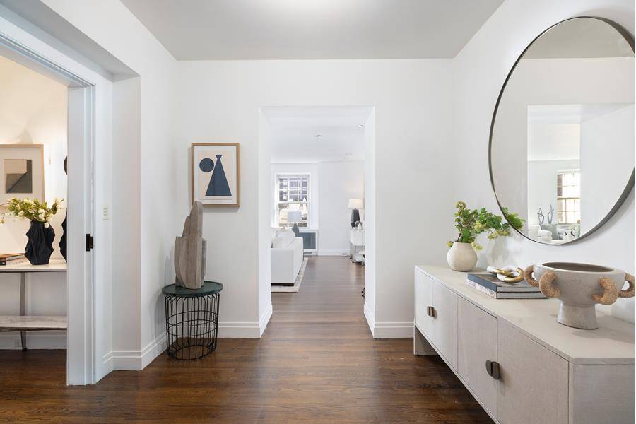 Presenting Residence 7A, an exquisite 5 bedroom, 4 bath home embodying the essence of pre war charm and grace.