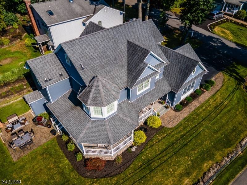 Welcome Home to this one of a kind spectacular custom colonial in desirable Packanack Lake.