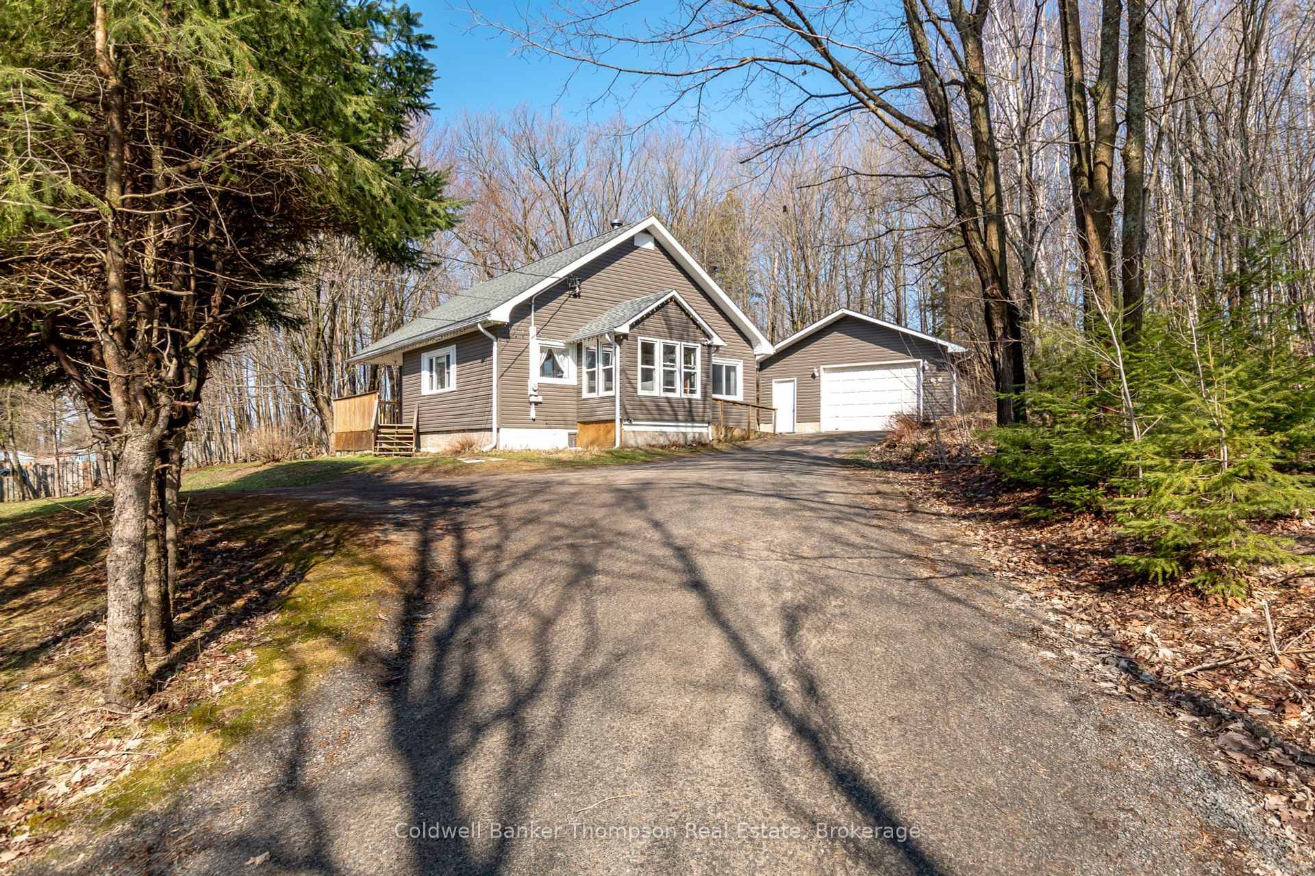 Amazing opportunity ! Set well back from the road on over 1 acre with 170 feet of frontage, this property offers space, privacy, and excellent curb appeal with low maintenance ...