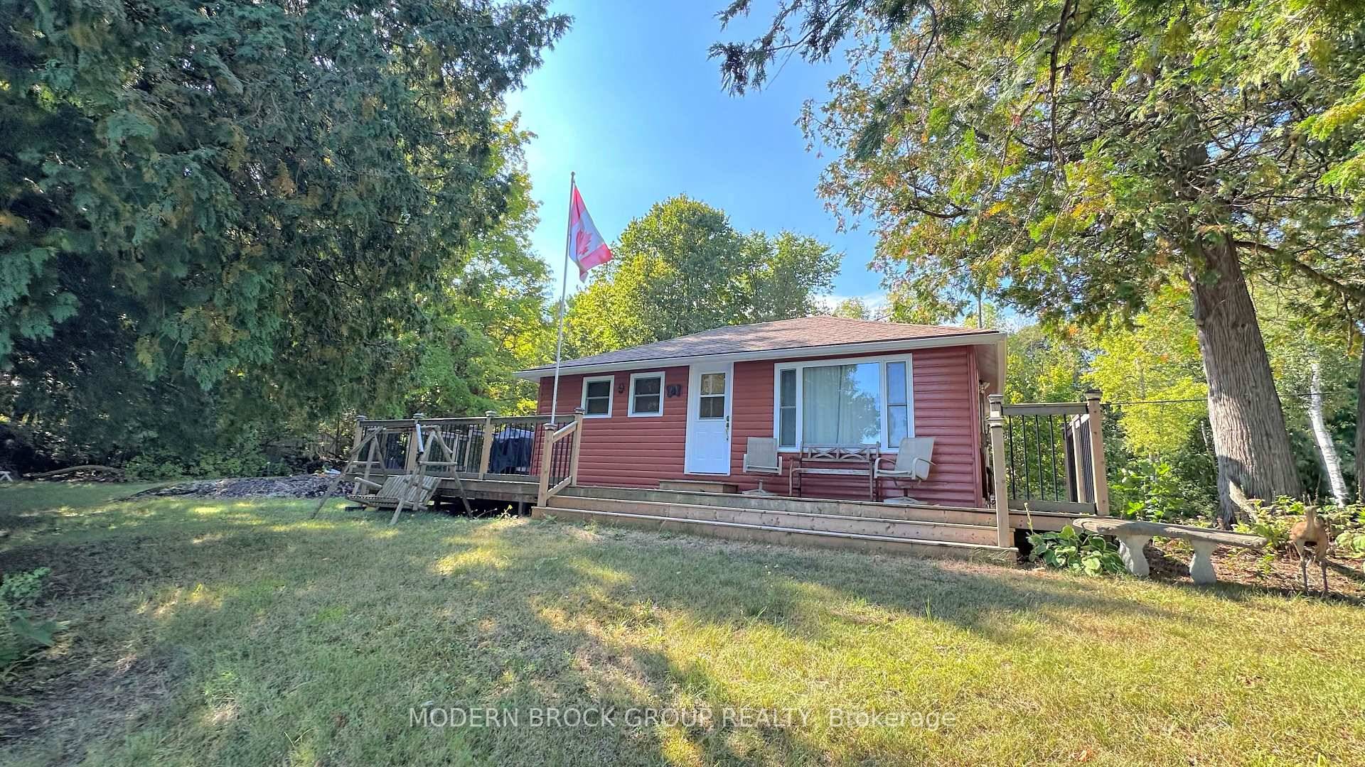 Welcome to 1221 LB12 Lyndhurst, a charming 2 bedroom, 1 bath waterfront cottage on beautiful Lower Beverly Lake.