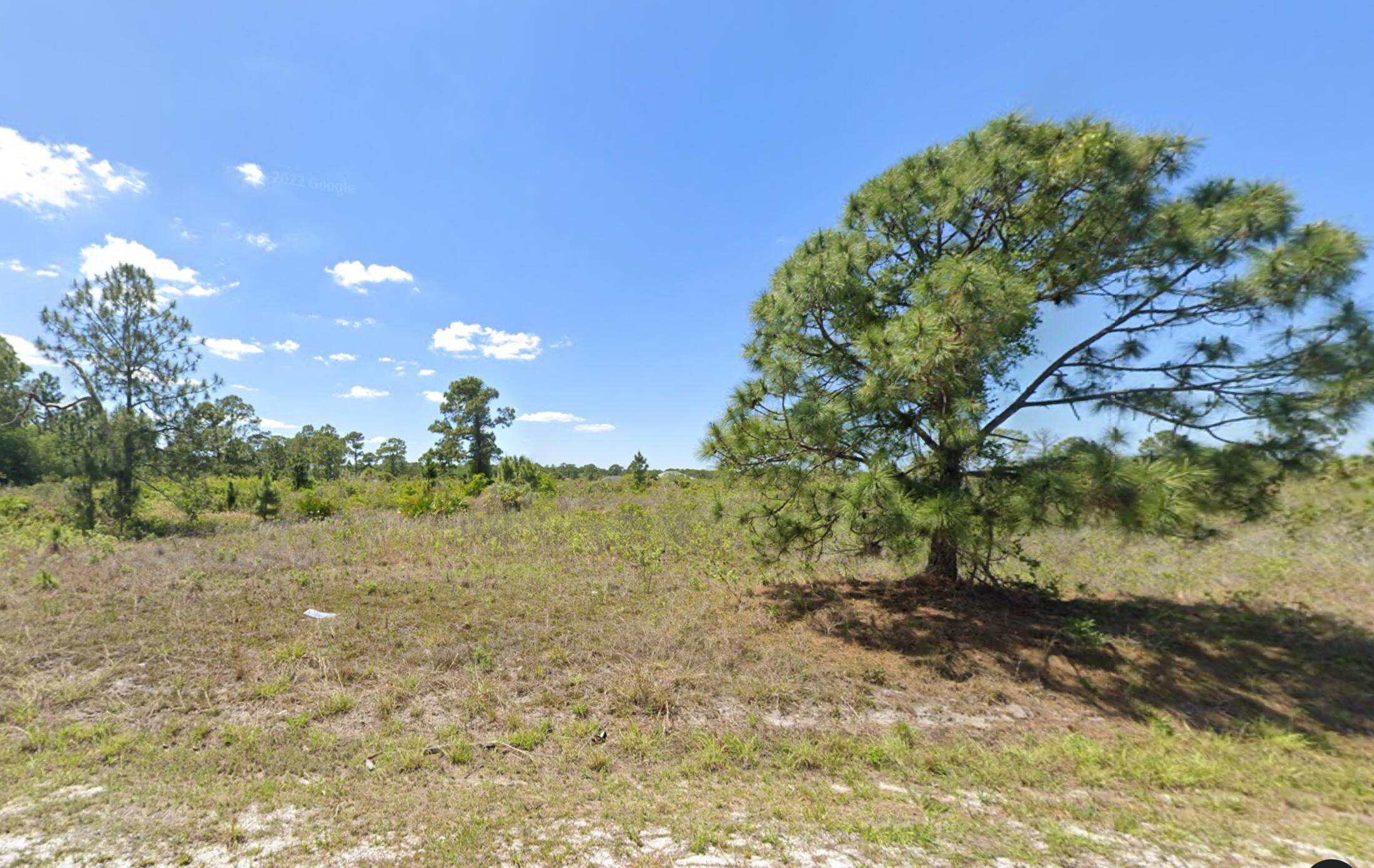 Unlock the potential of your dream property with these three adjoining half acre lots, offering a combined total of 1.