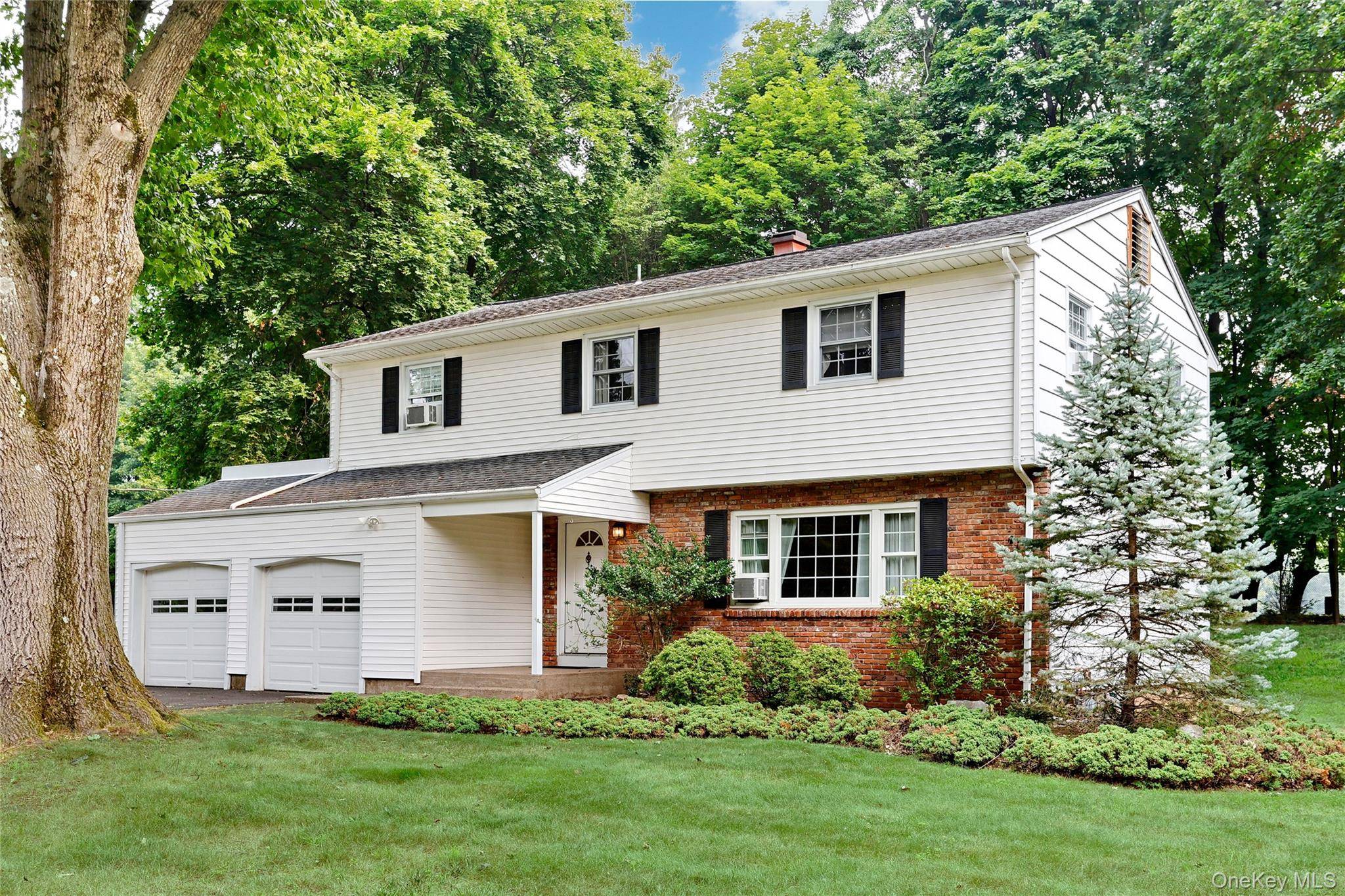 Airmont ! Beautiful side hall colonial situated on a manicured 0.