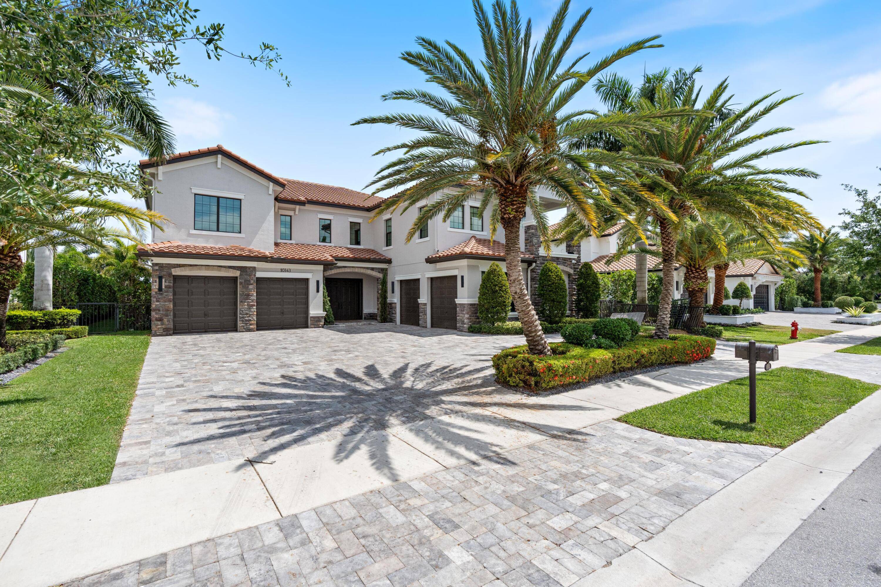 This stunning 5 bed, 6 bath lakefront estate blends modern elegance with resort style living.
