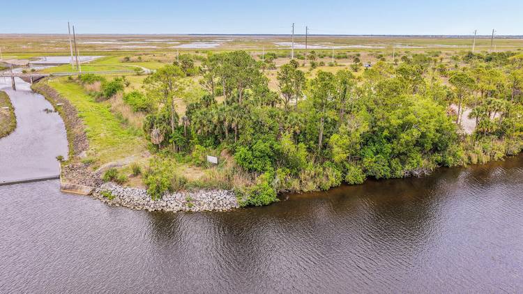 Set along 5 pristine acres on the storied St.