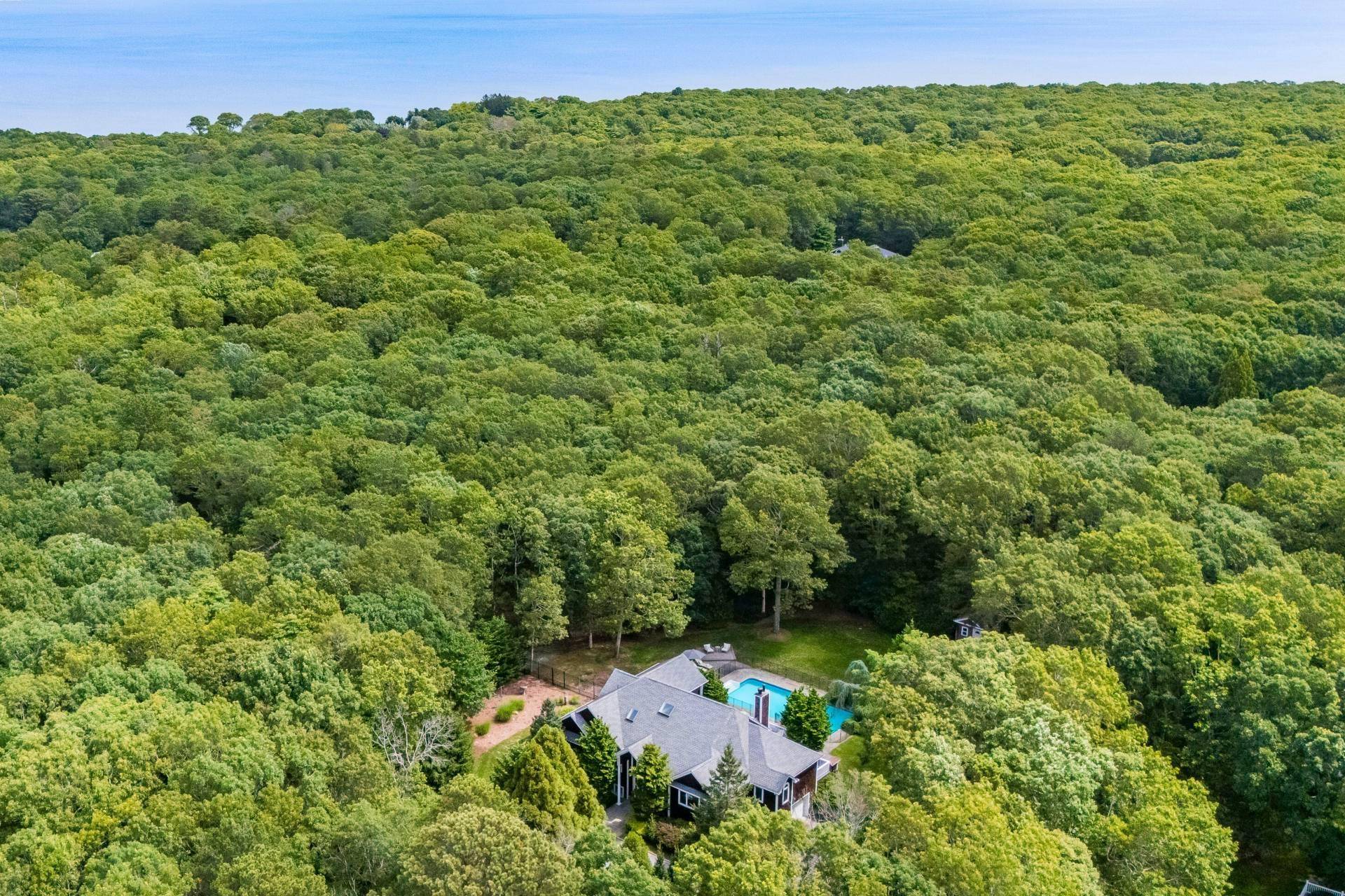 Hampton Bays Chic Residence with Pool, Privacy and Style Privately sited down a long drive and surrounded by lush landscaping, this turnkey 4 bedroom, 4 bath home offers over 4, ...