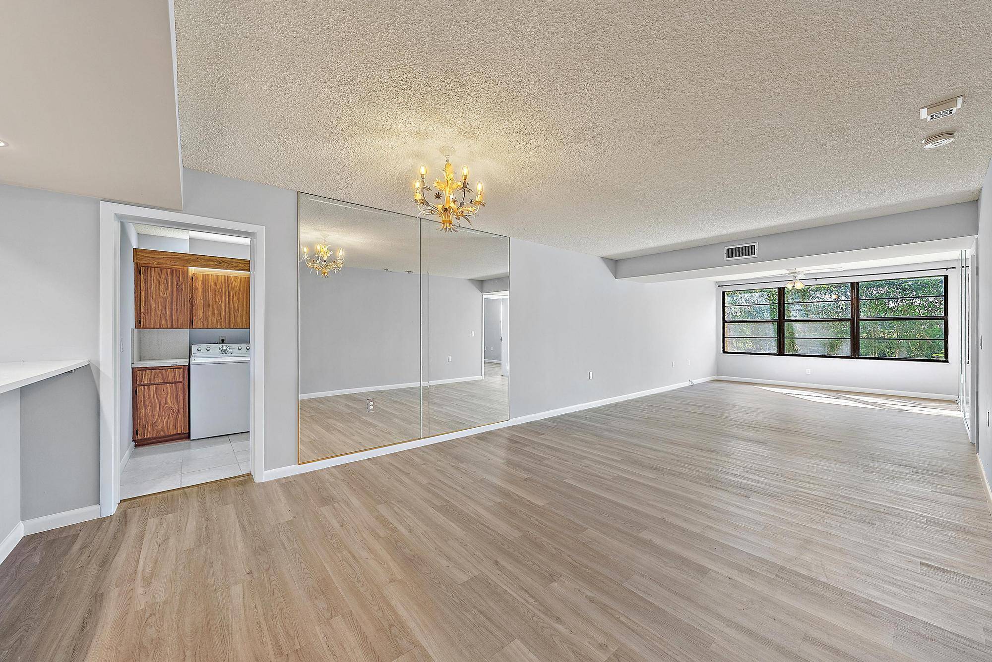 Super cute condo with updated kitchen and flooring Impact windows.