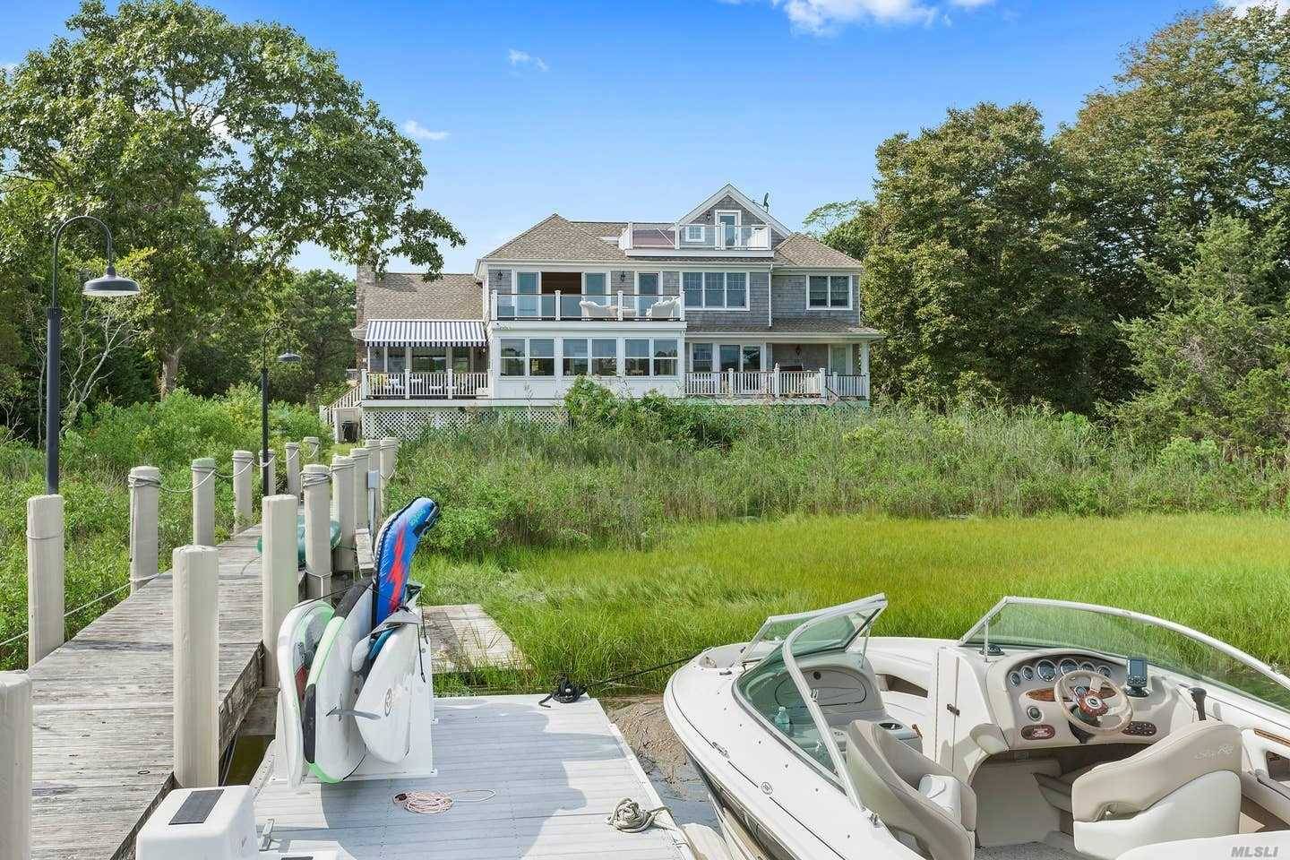 This Amazing nearly 4000 Sf Waterfront Post Modern Home Has Everything You Could Want For Your Post Labor Day Retreat.