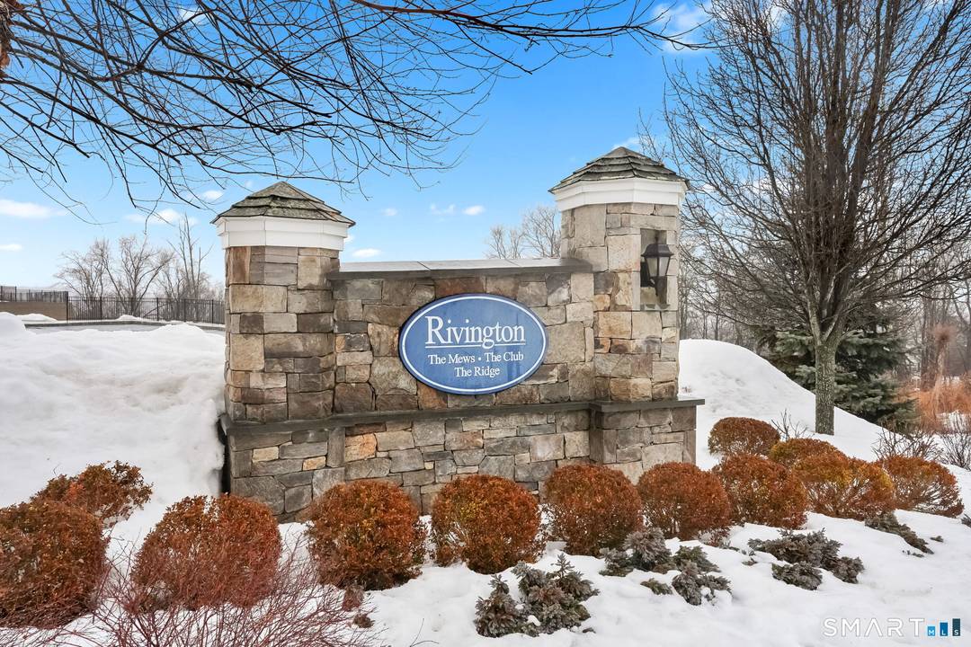 Welcome to this pristine one level, 2 bedroom, 2 bath upper level Branford model in Rivington's premier resort style community.