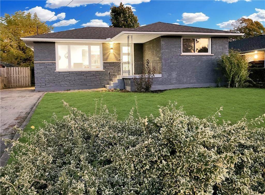 Welcome to 89 Greeningdon Drive, a beautifully updated solid brick bungalow in a quiet, family friendly neighbourhood.