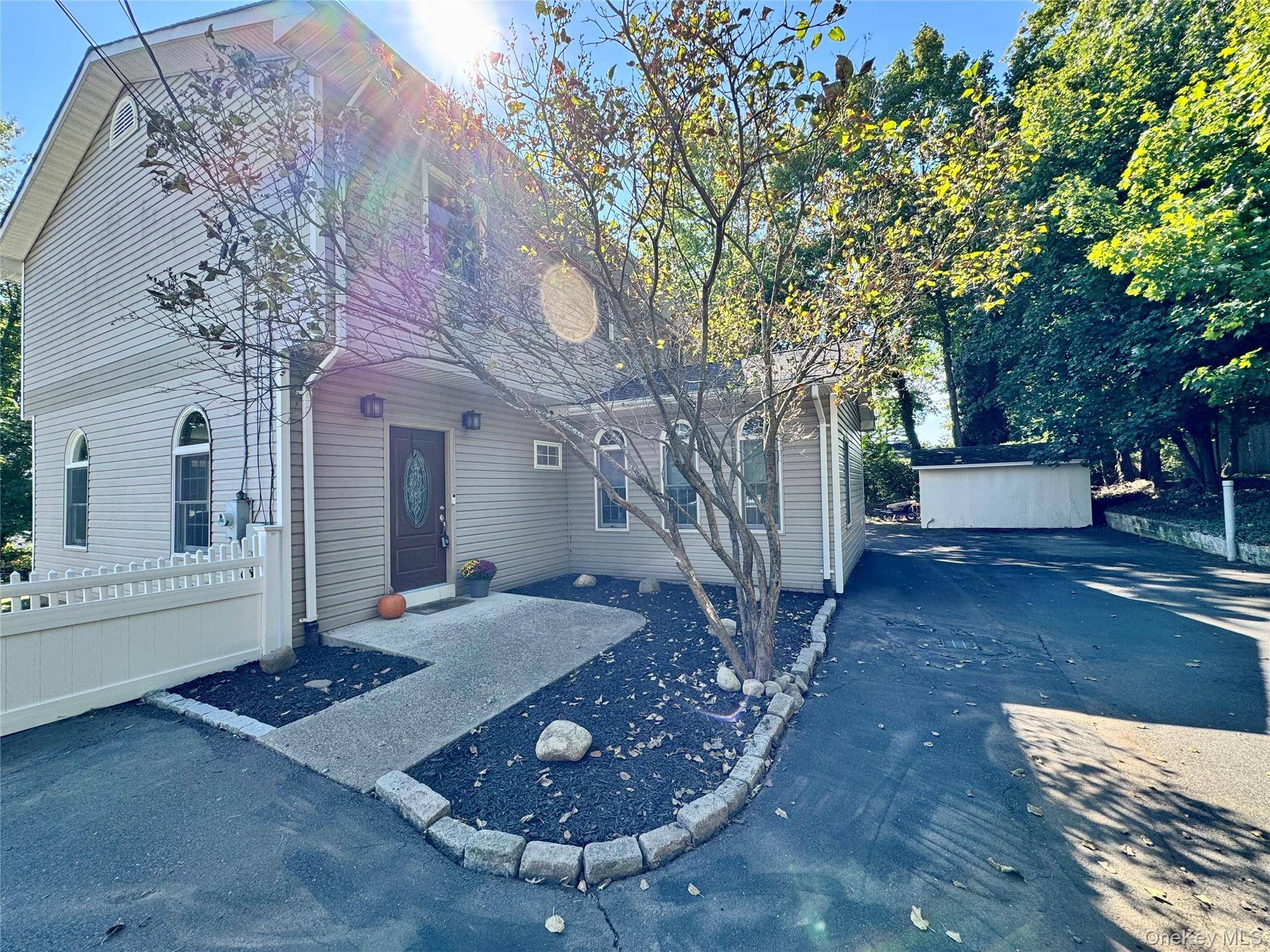 Welcome to this stunning 3 bedroom, 2 bathroom colonial home situated within the Pearl River School District, in the sought out Nauraushaun neighborhood !