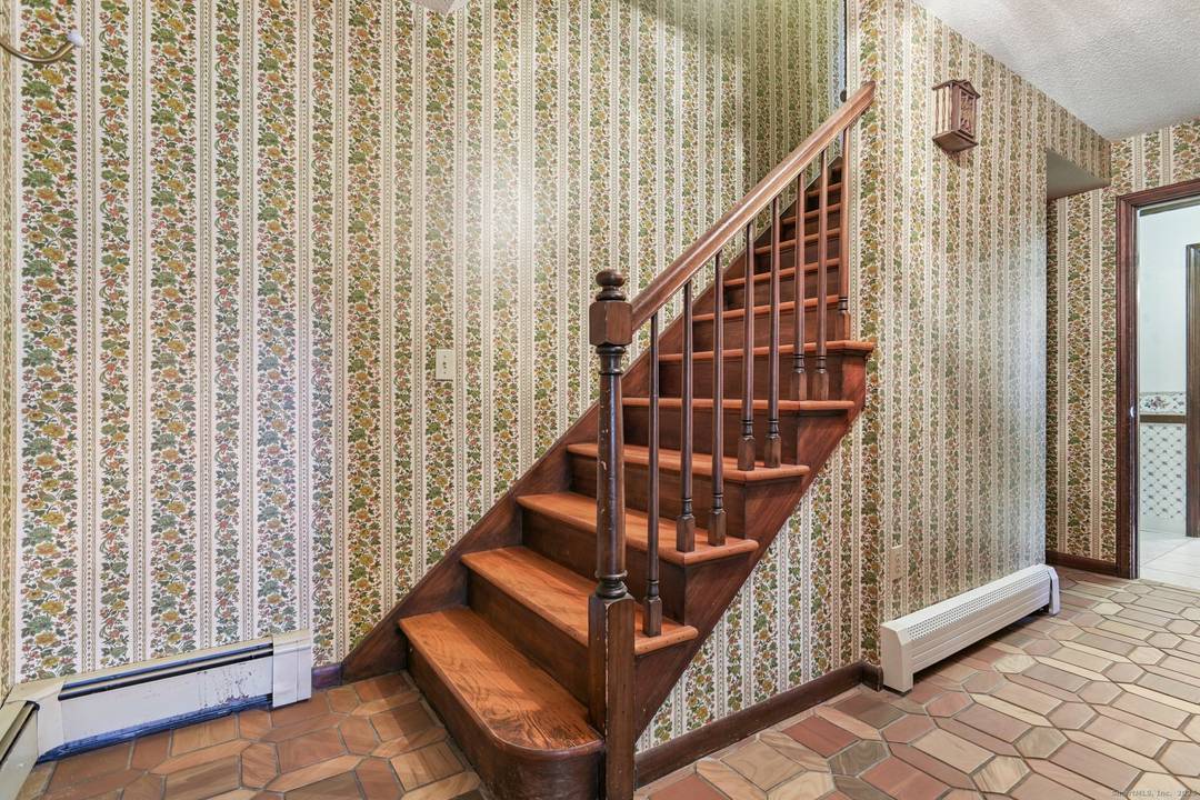 Situated on a peaceful side street in the Greenhaven Road neighborhood, 16 Green Avenue offers a welcoming and well crafted living space.