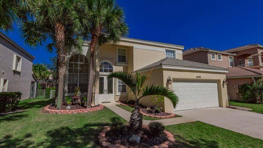 SPACIOUS 2 STORY POOL HOME ON PRESERVE IN MADISON GREEN.