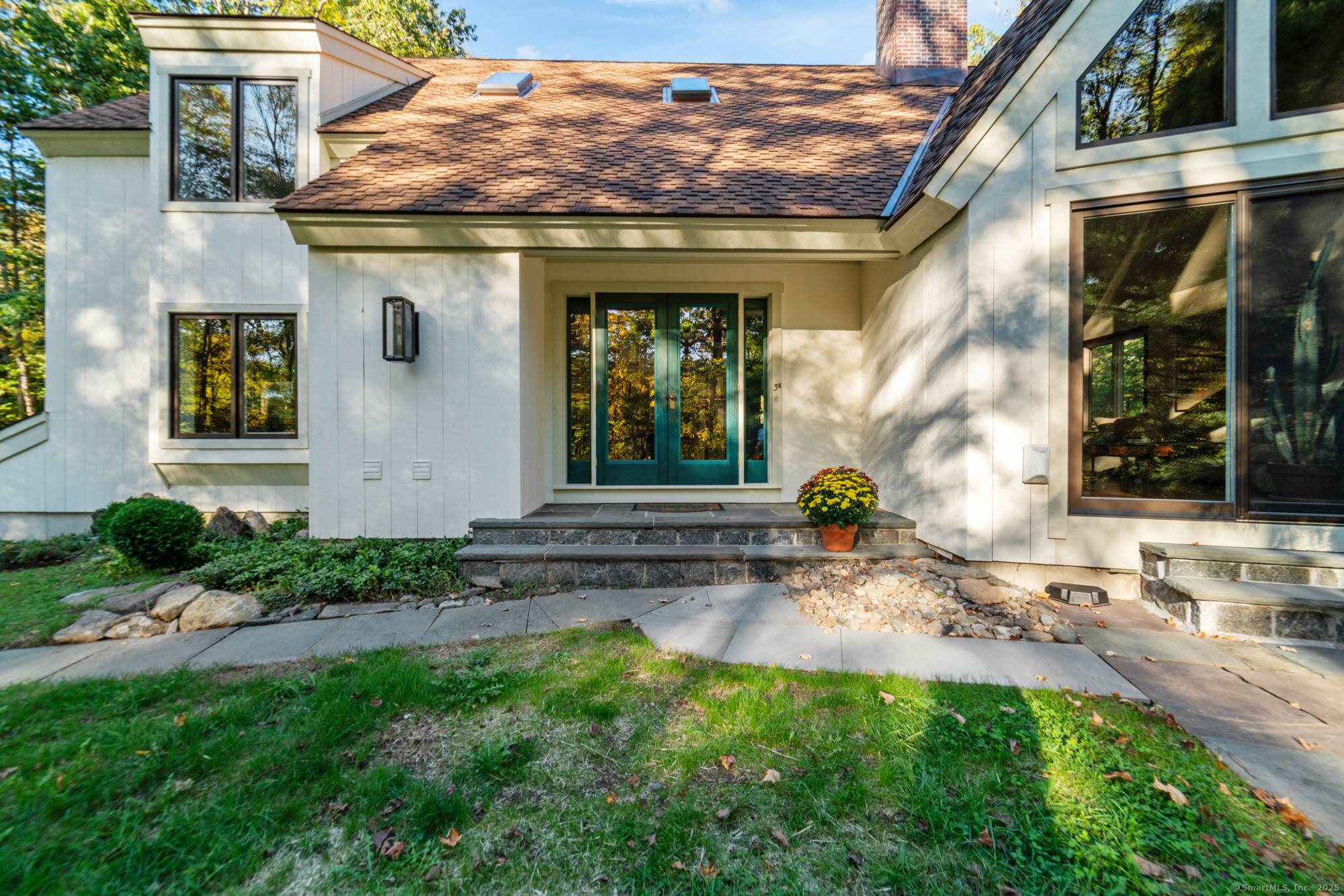 A showcase of late Mid Century inspired architecture, this exceptional custom built home combines striking design with a tranquil private setting just minutes from shopping, dining, and recreation.