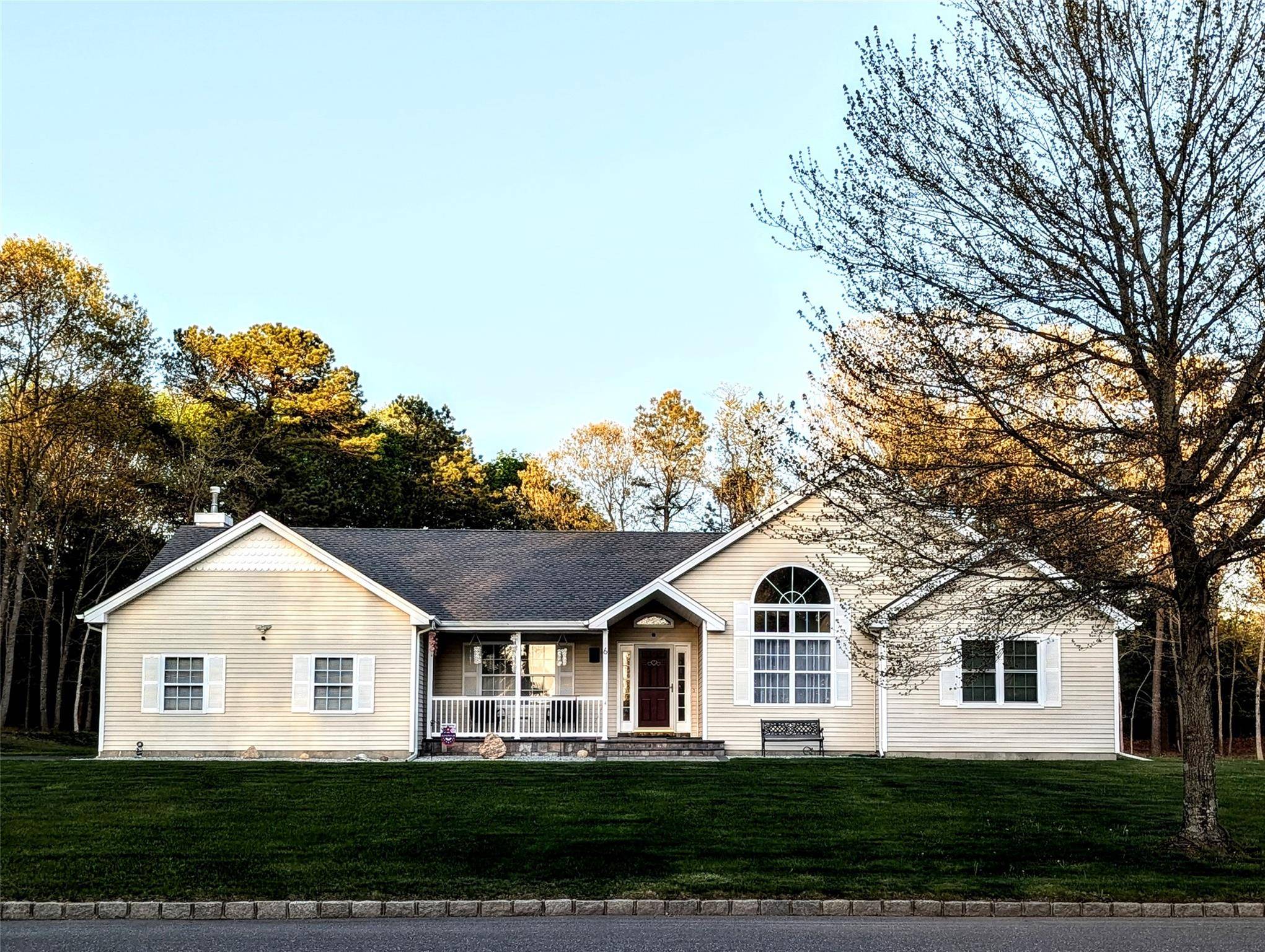 Sprawling Ranch in Silver Point, Middle Island This charming ranch style home in the desirable Silver Point community offers privacy, stunning sunset views, and backs to a serene nature preserve.