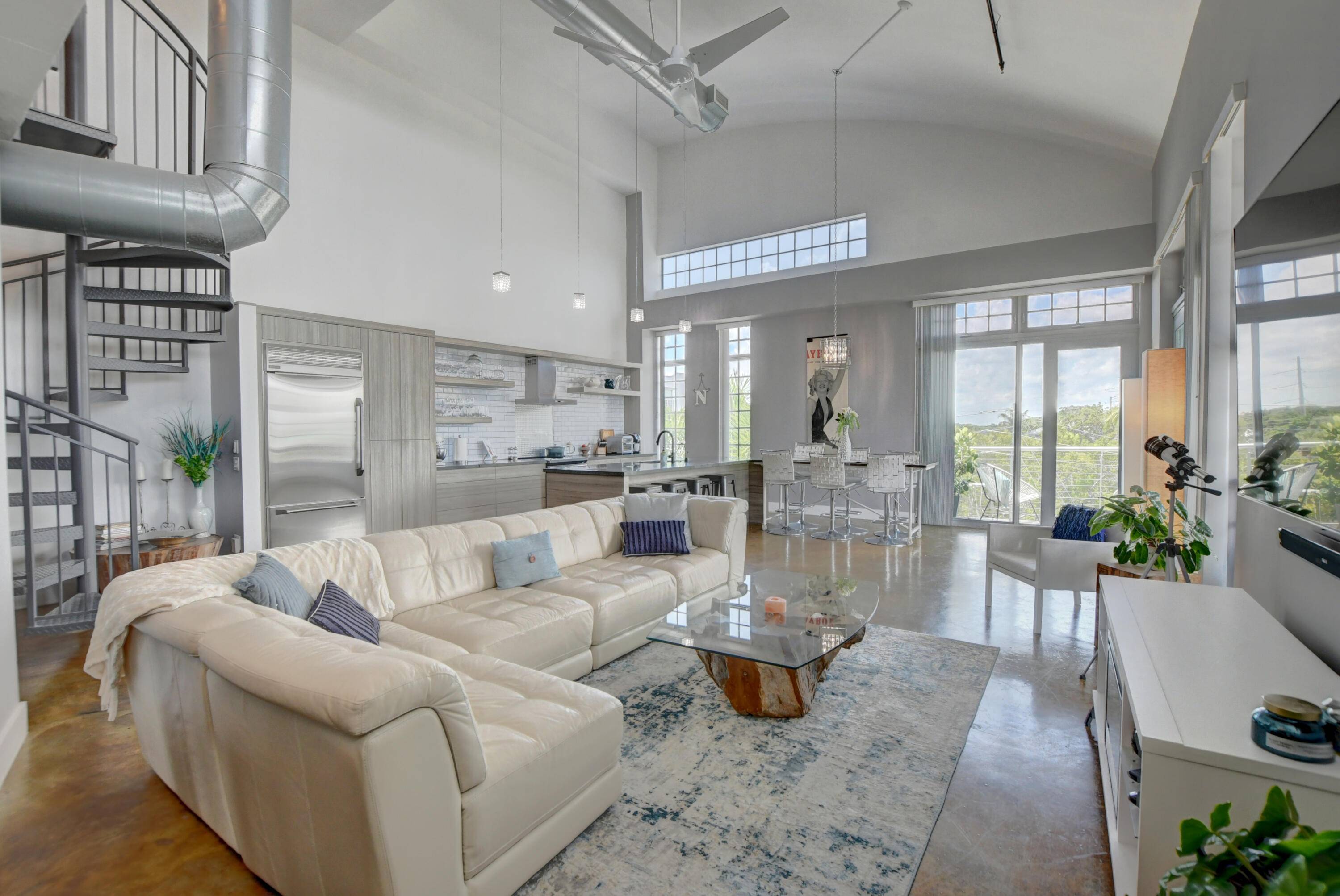 Stunning corner penthouse loft in East Delray Beach short walk to Atlantic Ave, the beach, shops restaurants nightlife.