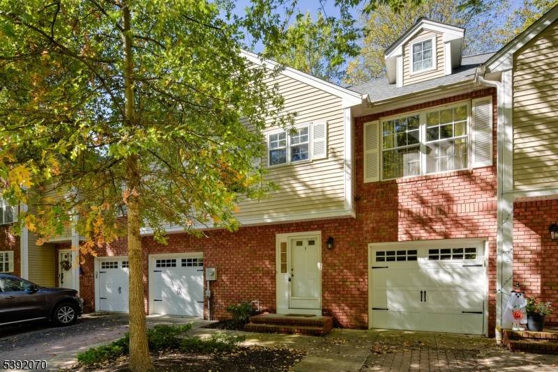 Welcome to 5 Berkeley Square, a beautifully maintained 2 bedroom, 2.