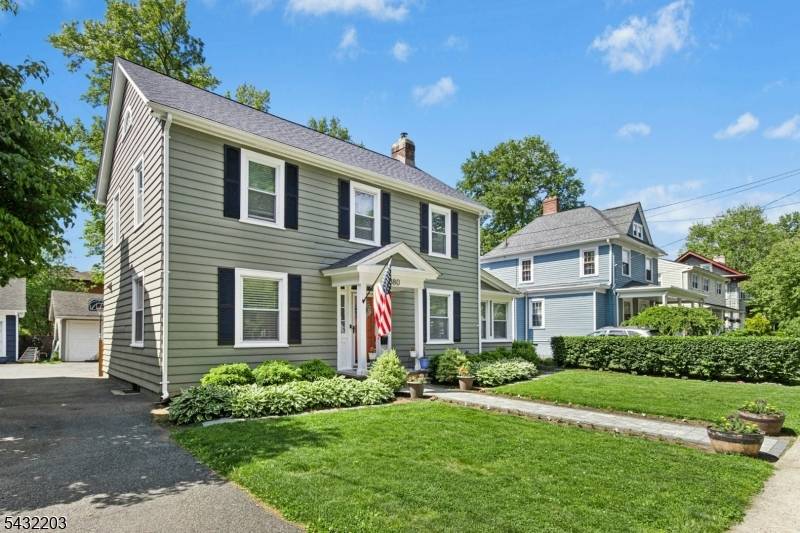 Welcome to this classic Center Hall Colonial, ideally situated on a picturesque tree lined street in the historic town of Rahway.