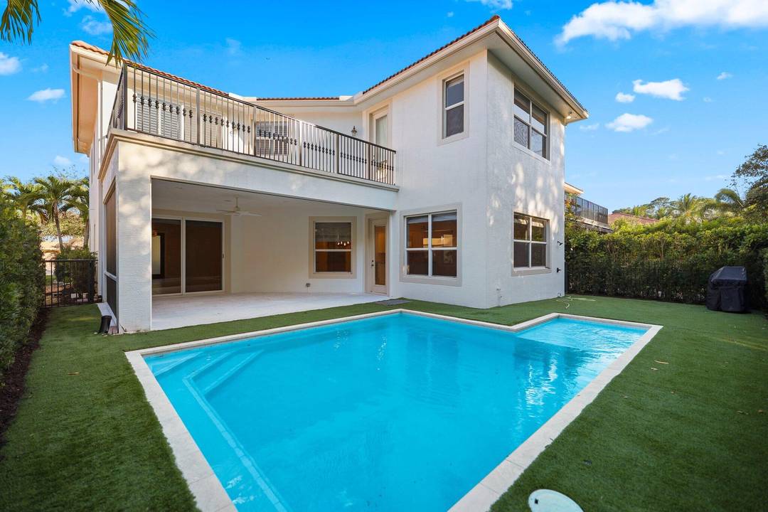 Welcome to 12285 Aviles Circle, an elegant 5 bedroom, 4 bath residence nestled in the heart of Palm Beach Gardens.