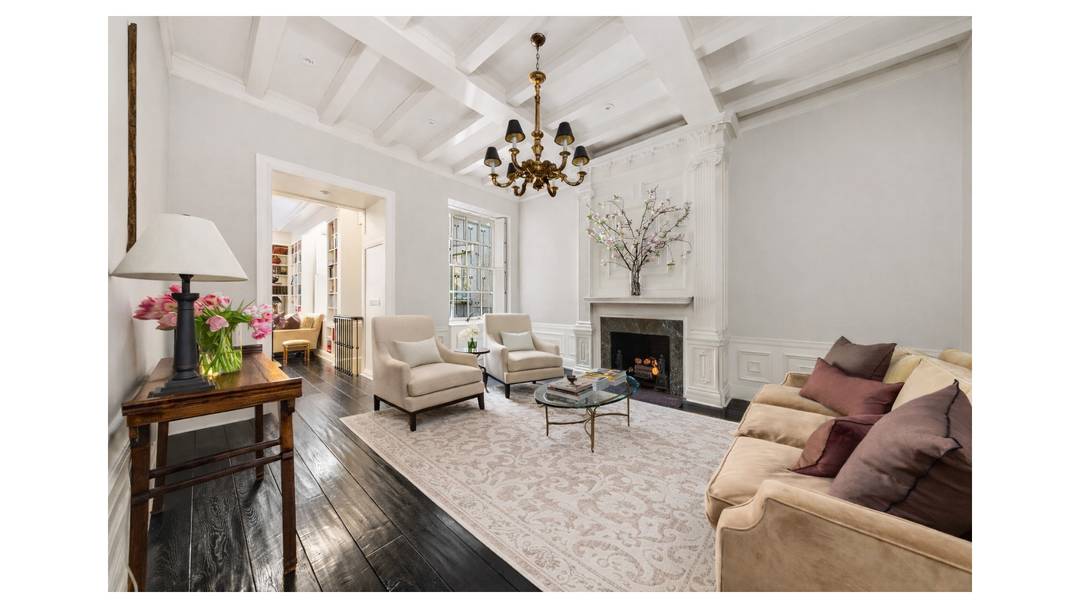 Exquisite Central Park Duplex in a Neo Georgian Mansion with Private Landscaped Garden Step back in time at 18 WEST 74TH STREET, a rare 1904 Upper West Side residence.