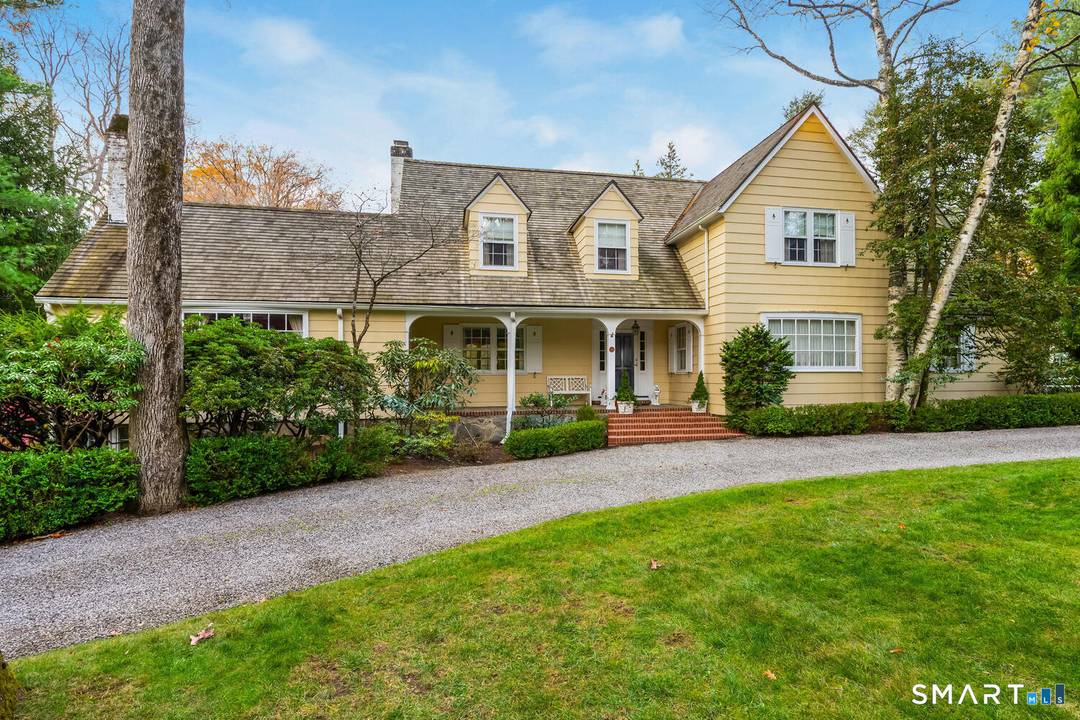 An opportunity rarely found in Darien's coveted Ridge Acres Association.